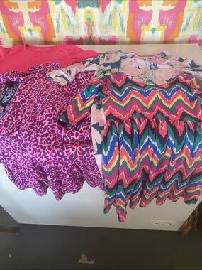 4 Lilly Pulitzer knit dresses. Sz large (8/10). Good condition. Some w/ pockets.